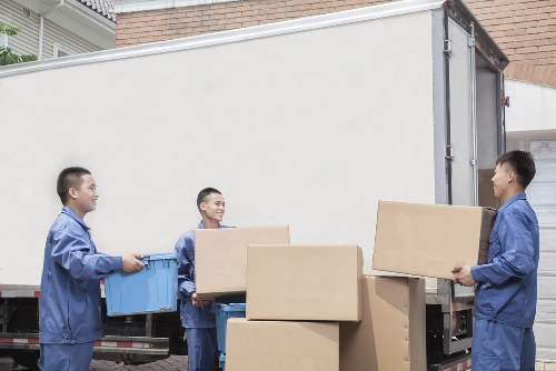 Moving van and packing boxes outside a Bromley property