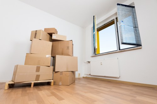 Packed household boxes and furniture ready for a Bromley home relocation