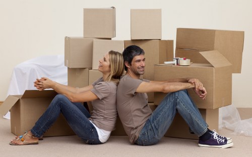 Professional movers planning access for a Bromley property