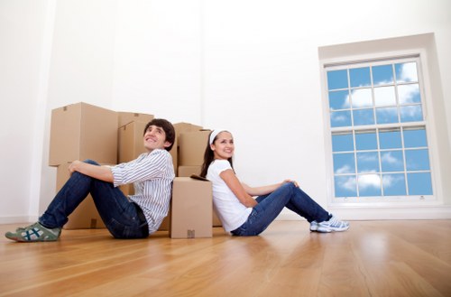 Packed moving boxes and furniture prepared for transport