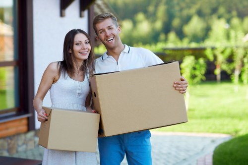 Removal team handling household items in Bromley with care