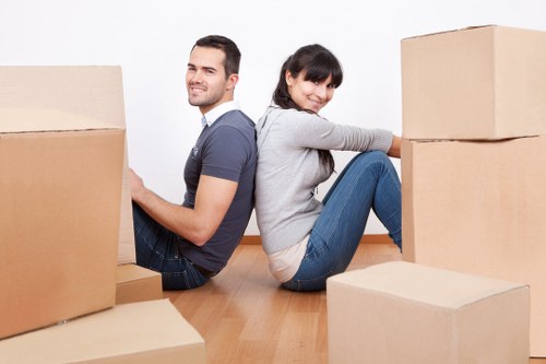 Local movers handling boxes and furniture for a Bromley house removal