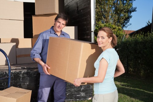 Removal team loading furniture from a Bromley residential property